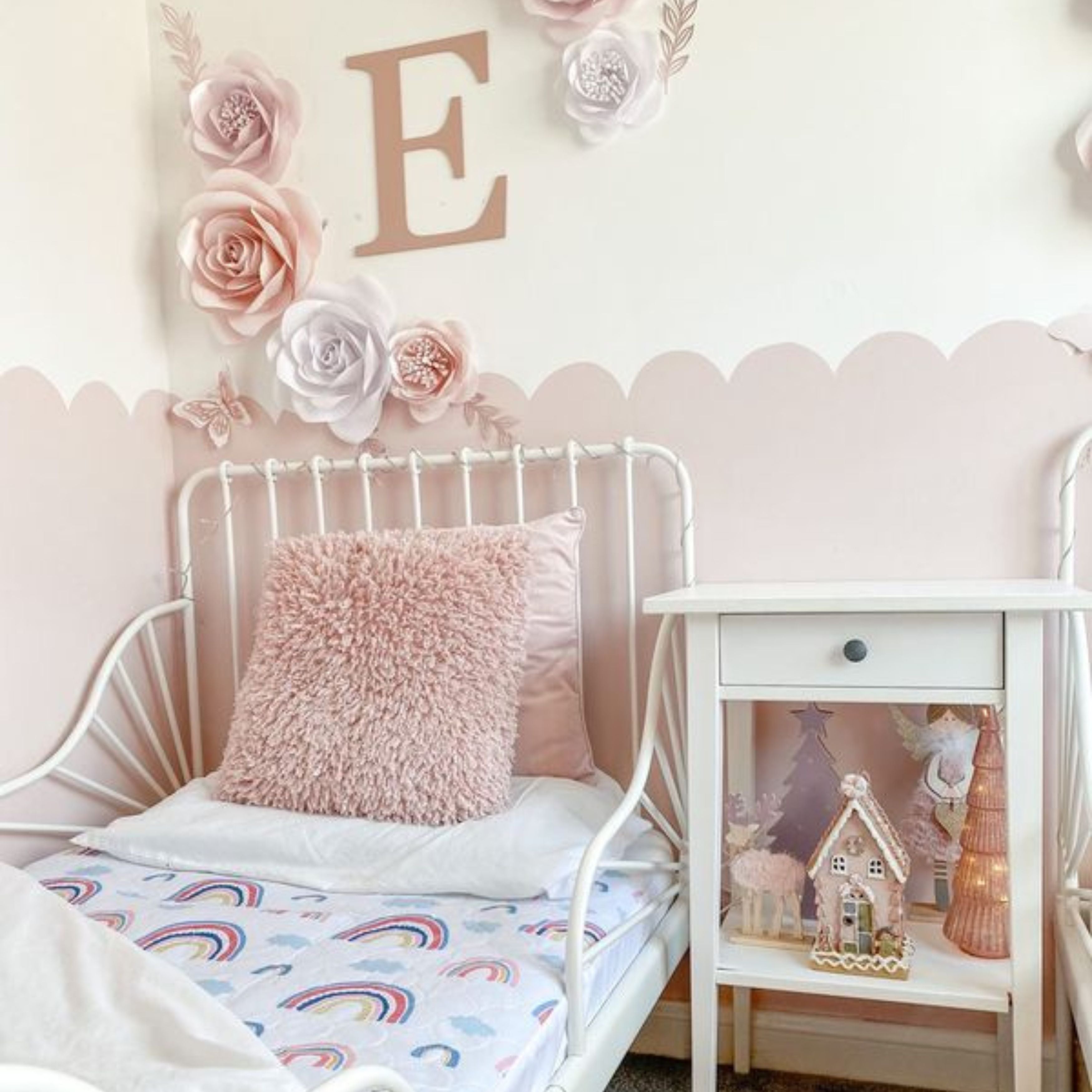 Bedroom using a rainbow mattress protector.