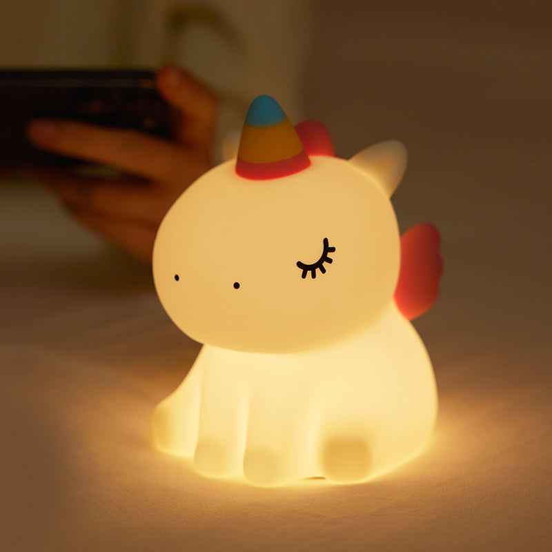 A night light turned on designed to look like a unicorn