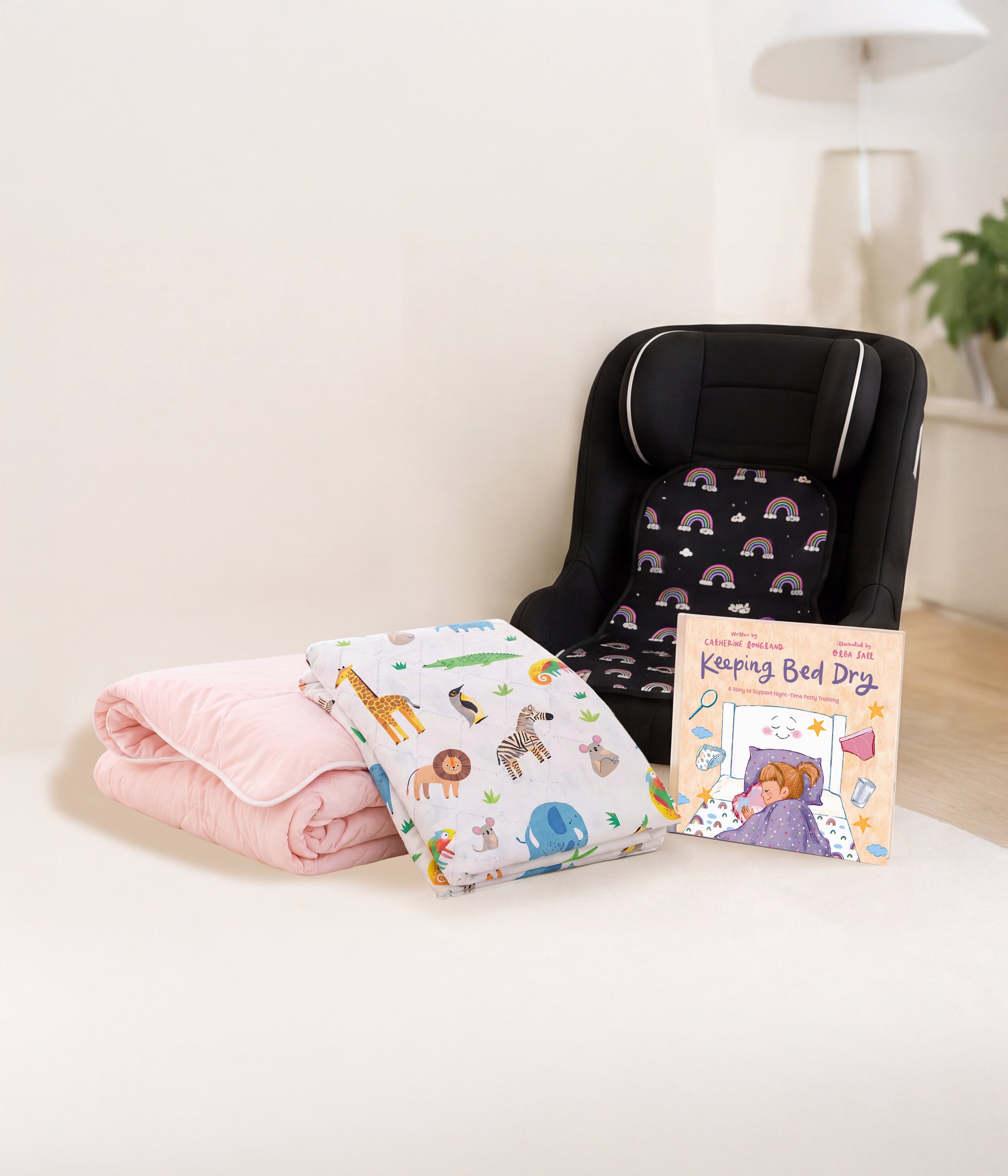 Rainbow car seat protector, pink coverless duvet, safari waterproof sheet and potty training book bundle items.